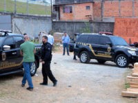 Police inspect the vehicles that were left by suspects involved in heist carried out at Sao Paulo's Guarulhos international airport, in the Jardim Pantanal neighborhood of Sao Paulo, Brazil, Thursday, July 25, 2019. Authorities at Sao Paulo's Guarulhos international airport say eight armed men raided a terminal and escaped with …