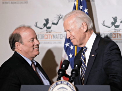 Detroit Mayor Mike Duggan, left, greets Vice President Joe Biden at a ceremony honoring 15 Detroit entrepreneurs, Tuesday, Jan. 10, 2017, in Detroit. The entrepreneurs earned Motor City Match grants to open or expand their business in the city. (AP Photo/Carlos Osorio)