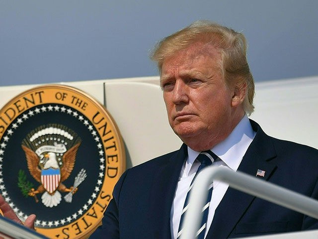 US President Donald Trump steps off Air Force One upon arrival at Andrews Air Force Base i