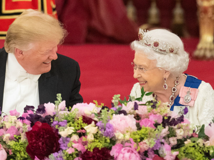 TOPSHOT - Britain's Queen Elizabeth II (R) laughs with US President Donald Trump during a State Banquet in the ballroom at Buckingham Palace in central London on June 3, 2019, on the first day of the US president and First Lady's three-day State Visit to the UK. - Britain rolled …