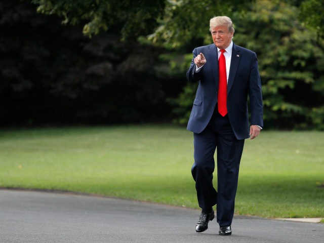 President Donald Trump walks to speak to members of the media at the White House in Washington, Wednesday, July 24, 2019, as he departs for a short trip to Andrews Air Force Base, Md., and onto Wheeling, W.Va., for a fundraiser. (AP Photo/Carolyn Kaster)