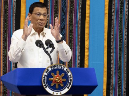 Philippine President Rodrigo Duterte gestures as he delivers his state of the nation address at Congress in Manila on July 22, 2019.  (Photo by Noel CELIS / AFP) (Photo credit should read NOEL CELIS/AFP/Getty Images)