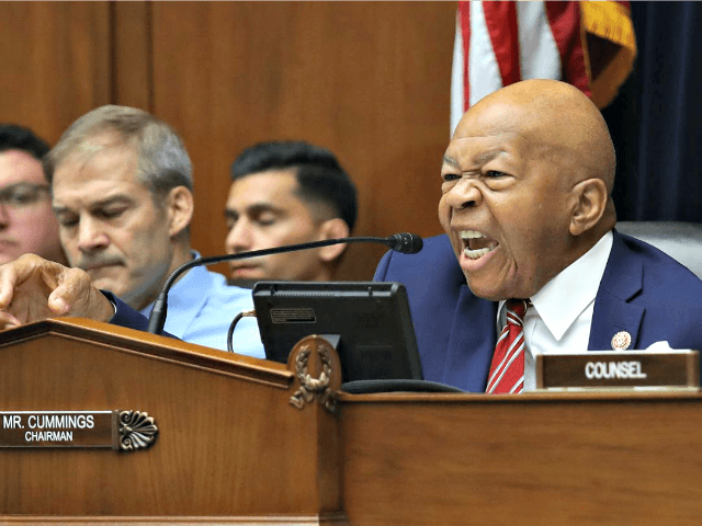 Committee Chairman Rep. Elijah Cummings, right, challenges acting Homeland Security Secret