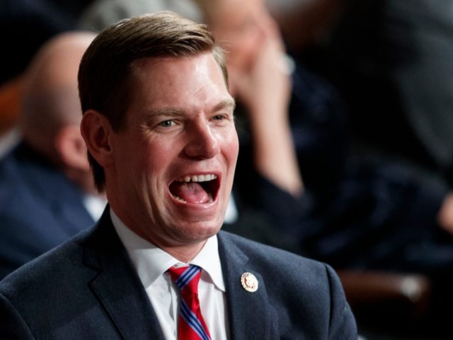 Rep. Eric Swalwell, D-Calif., stands on the House Floor at the Capitol in Washington, Thur