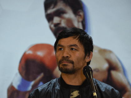 Philippine boxing icon Manny Pacquiao listens to a question during a press conference shortly after arriving at the international airport in Manila on January 24, 2019, days after defeating US boxer Adrien Broner in Las Vegas. (Photo by TED ALJIBE / AFP) (Photo credit should read TED ALJIBE/AFP/Getty Images)