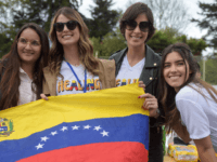 Miss Universe 2008 Venezuelan Dayana Mendoza (2-R), Miss Universe 2009 Venezuelan Stefania Fernandez (2-L) and Miss Universe 2014 Colombian Paulina Vega (R) pose for a picture during the "Healing" event to collect aid food and supplies for Venezuelans affected by the crisis, in Bogota on March 31, 2019. (Photo by …