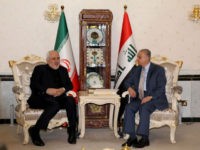 Iraqi Foreign Minister Mohammad Ali al-Hakim (R) meets Iran's Foreign Minister Mohammad Javad Zarif in Baghdad on May 26, 2019. (Photo by SABAH ARAR / AFP) (Photo credit should read SABAH ARAR/AFP/Getty Images)
