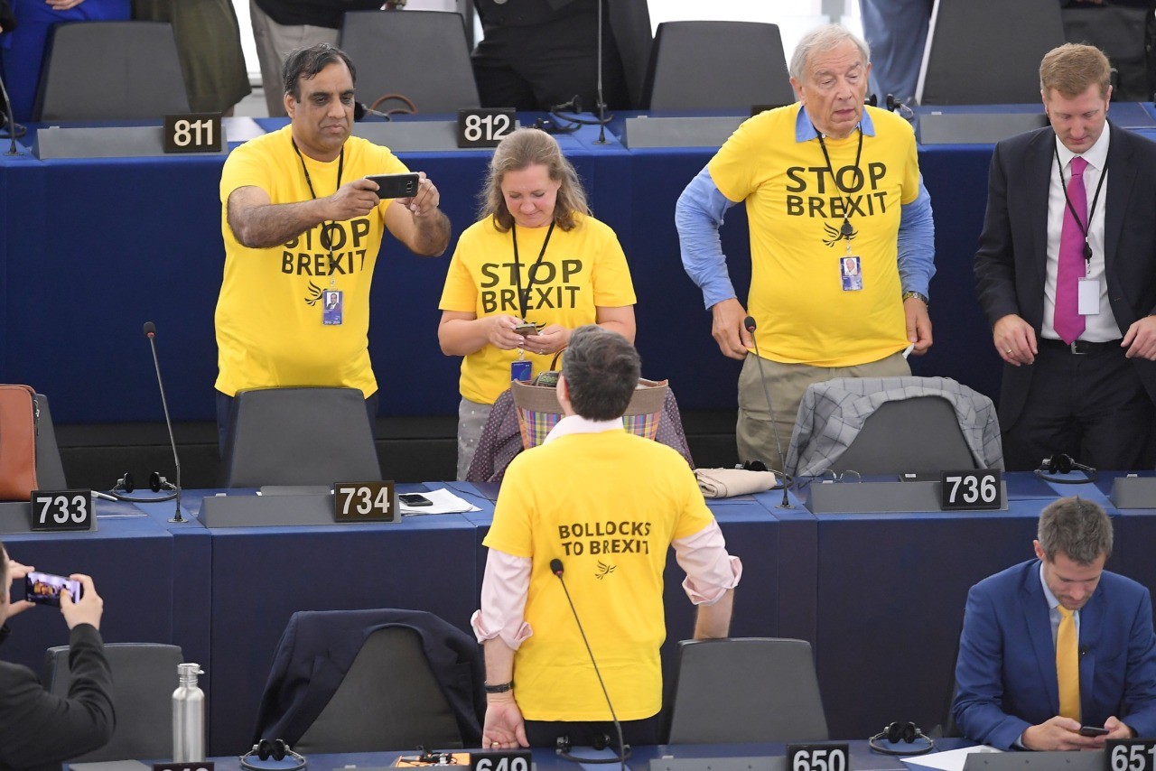 Newly elected MEPs, wearing t-shirts with an inscription against the Brexit, attend the inaugural session at the European Parliament on July 2 , 2019 in Strasbourg, eastern France. - The 751-seat parliament is more fragmented than ever after a vote in May that saw solid gains by the liberals and Greens as well as the far right and eurosceptics. With Brexit delayed until as late as October 31, the deep political divisions in Britain were on full display in the eastern French city as 73 British MEPs arrived to parliament. (Photo by FREDERICK FLORIN / AFP)        (Photo credit should read FREDERICK FLORIN/AFP/Getty Images)