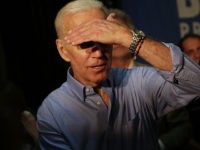 MARSHALLTOWN, IA - JULY 04: Former Vice President and 2020 presidential candidate Joe Biden blocks the light as he greets attendees during a campaign event on July 4, 2019 in Marshalltown, Iowa. The 2020 Iowa Democratic caucuses will take place on Monday, February 3, 2020. (Photo by Joshua Lott/Getty Images)