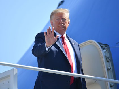 US President Donald Trump boards Air Force One departing from Andrews Air Force Base in Maryland on July 12, 2019. - Trump is traveling to Milwaukee, Wisconsin and Cleveland, Ohio. (Photo by MANDEL NGAN / AFP) (Photo credit should read MANDEL NGAN/AFP/Getty Images)
