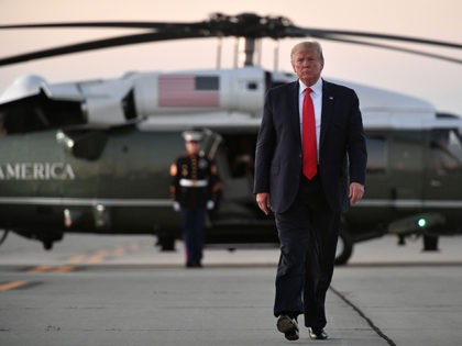 US President Donald Trump makes his way to board Air Force One before departing from Cleveland Hopkins International Airport in Cleveland, Ohio on July 12, 2019. (Photo by MANDEL NGAN / AFP) (Photo credit should read MANDEL NGAN/AFP/Getty Images)