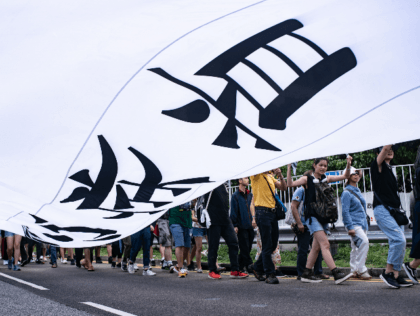 People attend a rally against a controversial extradition law proposal in Sha Tin district