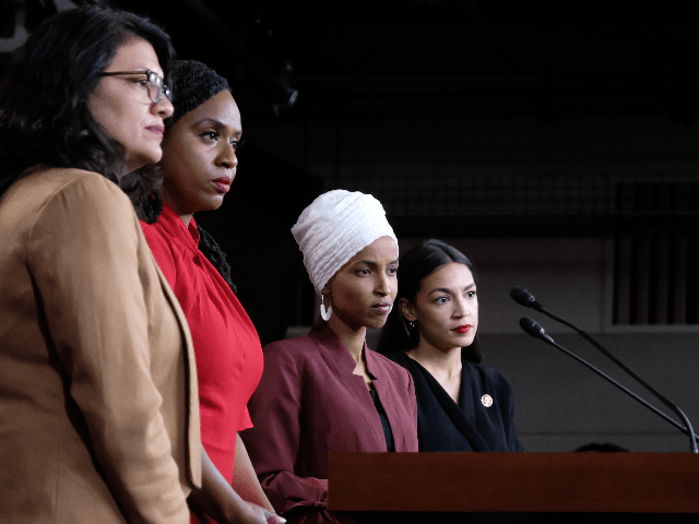 U.S. Rep. Rashida Tlaib (D-MI), Rep. Ayanna Pressley (D-MA), Rep. Ilhan Omar (D-MN), and Rep. Alexandria Ocasio-Cortez (D-NY) pause between answering questions during a press conference at the U.S. Capitol on July 15, 2019 in Washington, DC. President Donald Trump stepped up his attacks on four progressive Democratic congresswomen, saying …