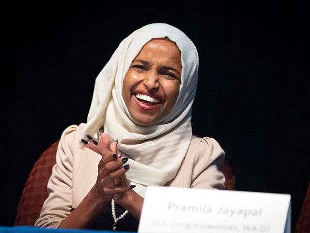 US Representative Ilhan Omar (D-MN) speaks on stage during a town hall meeting at Sabathani Community in Minneapolis, Minnesota on July 18, 2019. (Photo by Kerem Yucel / AFP) (Photo credit should read KEREM YUCEL/AFP/Getty Images)