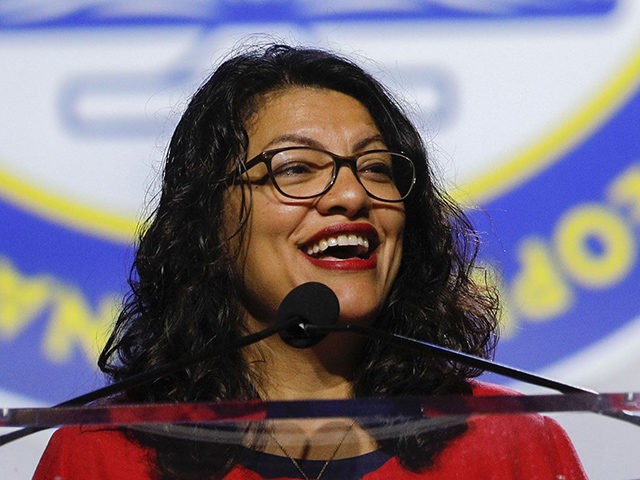 DETROIT, MI - JULY 22: U.S. Rep. Rashida Tlaib (D-MI) speaks at the opening plenary session of the NAACP 110th National Convention at the COBO Center on July 22, 2019 in Detroit, Michigan. The convention is from July 20 to July 24 with the theme of, "When We Fight, We â¦