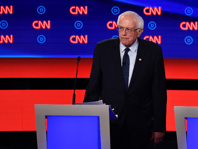 Democratic presidential hopeful US senator from Vermont Bernie Sanders looks on during a b