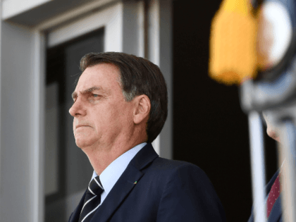 Brazilian President Jair Bolsonaro attends the changing of the guard ceremony at Planalto Palace in Brasilia, on July 31, 2019. - Bolsonaro met with US Secretary of Commerce Wilbur Ross Wednesday in Brasilia. (Photo by EVARISTO SA / AFP) (Photo credit should read EVARISTO SA/AFP/Getty Images)