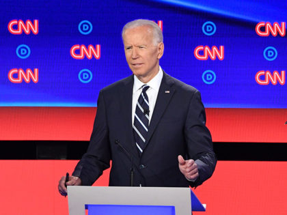 Democratic presidential hopefuls (fromL) US Senator from New Jersey Cory Booker looks on a