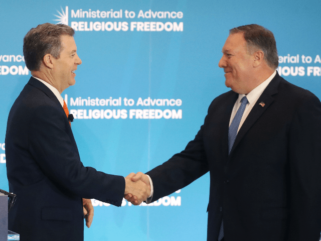 (L-R) Ambassador at Large for International Religious Freedom, Sam Brownback, introduces U.S. Secretary of State Mike Pompeo to deliver opening remarks at the second Ministerial to Advance Religious Freedom, at the Department of State, July 16, 2019 in Washington, DC. (Photo by Mark Wilson/Getty Images)