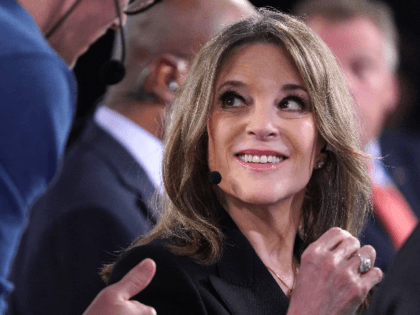 Democratic presidential candidate Marianne Williamson prepares for a television interview after the Democratic Presidential Debate at the Fox Theatre July 30, 2019 in Detroit, Michigan. 20 Democratic presidential candidates were split into two groups of 10 to take part in the debate sponsored by CNN held over two nights at …