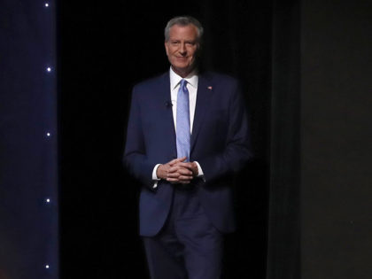 DETROIT, MICHIGAN - JULY 31: Democratic presidential candidate Rep. New York City Mayor Bill De Blasio takes the stage at the Democratic Presidential Debate at the Fox Theatre July 31, 2019 in Detroit, Michigan. 20 Democratic presidential candidates were split into two groups of 10 to take part in the …
