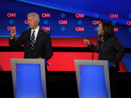 Democratic presidential candidate Sen. Kamala Harris (D-CA) (R) speaks while former Vice President Joe Biden listens during the Democratic Presidential Debate at the Fox Theatre July 31, 2019 in Detroit, Michigan. 20 Democratic presidential candidates were split into two groups of 10 to take part in the debate sponsored by …