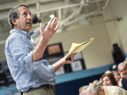 Rep. Mark Sanford (R-SC) addresses the crowd during a town hall meeting March 18, 2017 in Hilton Head, South Carolina. Protestors have been showing up in large numbers to congressional town hall meetings across the nation. (Photo by Sean Rayford/Getty Images)