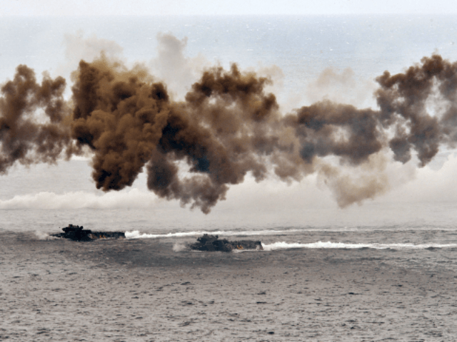 Amphibious assault vehicles release smoke during the "Han Kuang" (Han Glory) life-fire dri