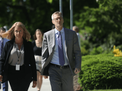 Portland mayor Ted Wheeler R arrives at Christ The King church for the funeral service of Army veteran and father of four, Ricky Best on June 5, 2017 in Milwaukie, Oregon. Best, 53, and Taliesin Namkai-Meche, 23, were stabbed to death and Micah Fletcher,21, was severely injured after they tried …