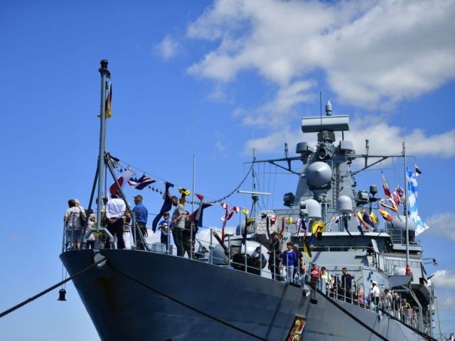 KIEL, GERMANY - JUNE 17: Visitors walk aboard the frigate "Mecklenburg Vorpommern" of the German Navy during an open day of the barracks at the Kieler Woche (Kiel Week) on June 17, 2017 in Kiel, Germany. The annual Tall Ships Parade, in which many of the world's largest traditional sailing …