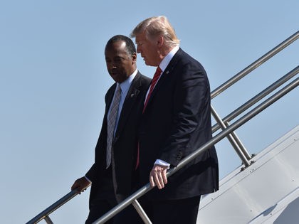 US President Donald Trump arrives in Reno, Nevada with Secretary of Housing and Urban Development Ben Carson(L), on August 23, 2017, where Trump will speak to the American Legion national convention. / AFP PHOTO / Nicholas Kamm (Photo credit should read NICHOLAS KAMM/AFP/Getty Images)