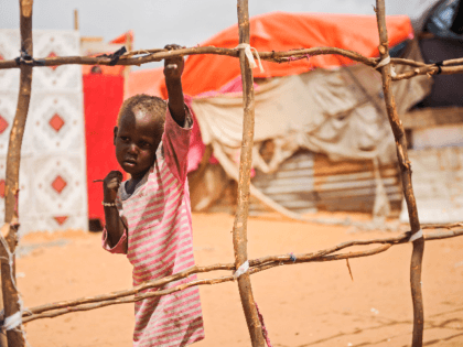A Somali boy stands next to a structure of makeshift tent at Tawakal IDP camp in Mogadishu, Somalia, on June 19, 2018. (Photo by Mohamed ABDIWAHAB / AFP) (Photo credit should read MOHAMED ABDIWAHAB/AFP/Getty Images)