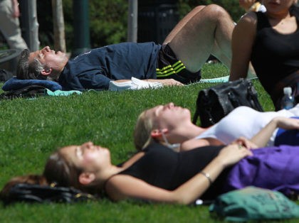 NEW YORK - APRIL 07: People sunbathe in the warm weather in Manhattan April 7, 2010 in New York City. Temperatures in the city were expected to near the daily record of 89 degrees set in 1929. (Photo by Mario Tama/Getty Images)