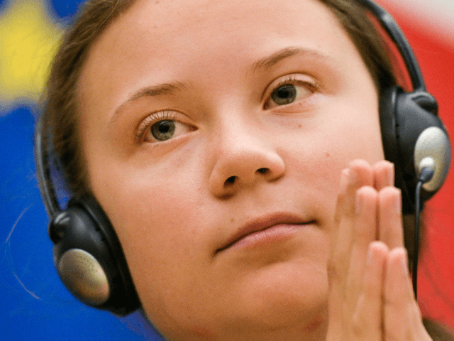 Swedish climate activist Greta Thunberg looks on after her speech during a meeting at the French National Assembly, in Paris, on July 23, 2019. (Photo by Lionel BONAVENTURE / AFP) (Photo credit should read LIONEL BONAVENTURE/AFP/Getty Images)