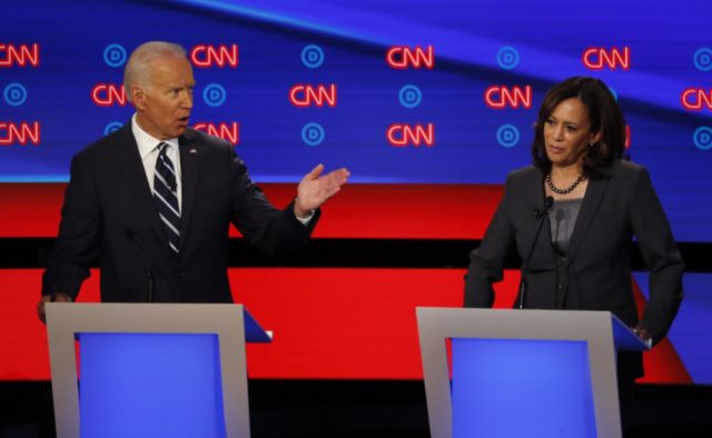 Former Vice President Joe Biden and Sen. Kamala Harris, D-Calif., participate in the second of two Democratic presidential primary debates hosted by CNN Wednesday, July 31, 2019, in the Fox Theatre in Detroit. (AP Photo/Paul Sancya)
