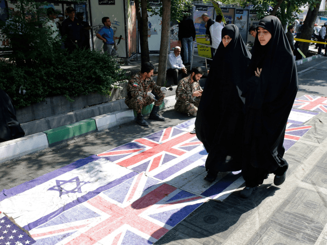 Iranians attend a parade marking al-Quds (Jerusalem) International Day in …