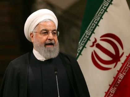 Iranian President Hassan Rouhani gives a joint press conference with the Japanese Prime Minister at the Saadabad Palace in the capital Tehran on June 12, 2019. - Japan's visiting Prime Minster Shinzo Abe called on Iran to play a "constructive role" for peace in the Middle East on Wednesday after …