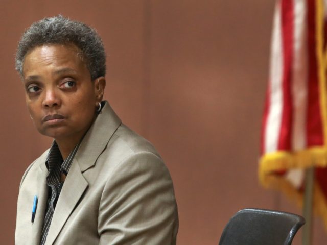 In this March 24, 2019 photo, Chicago mayoral candidate Lori Lightfoot listens to a questi