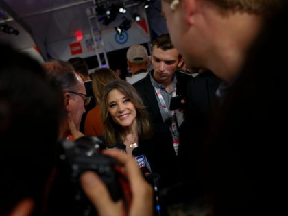 Marianne Williamson talks to reporters after the first of two Democratic presidential primary debates hosted by CNN Wednesday, July 31, 2019, in the Fox Theatre in Detroit. (AP Photo/Paul Sancya)