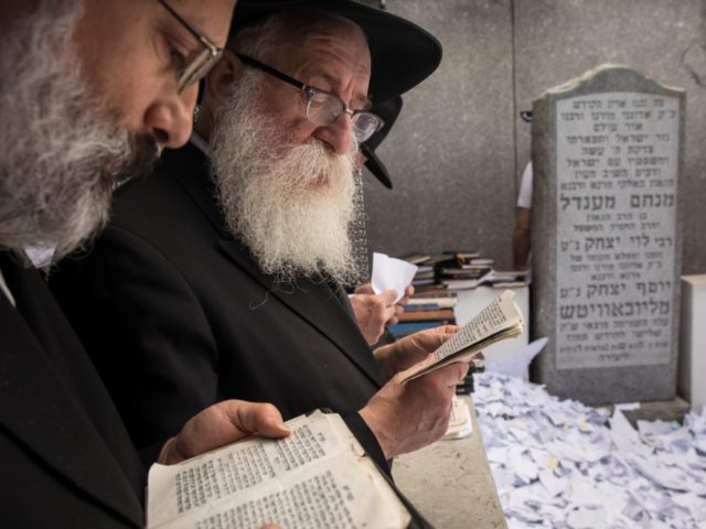 NEW YORK, NY - JUNE 15: Visitors pray at the gravesite of the Lubavitcher Rebbe, Rabbi Men