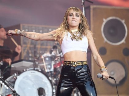 GLASTONBURY, ENGLAND - JUNE 30: Miley Cyrus performs on the Pyramid Stage on day five of Glastonbury Festival at Worthy Farm, Pilton on June 30, 2019 in Glastonbury, England. Glastonbury is the largest greenfield festival in the world, and is attended by around 175,000 people. (Photo by Leon Neal/Getty Images)