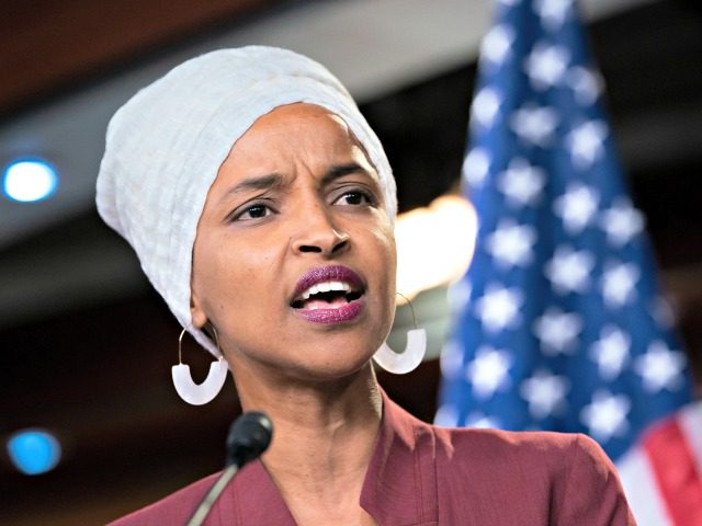 Rep. Ilhan Omar, D-Minn., respond to remarks by President Donald Trump after his call for the four Democratic congresswomen to go back to their broken countries, during a news conference at the Capitol in Washington, Monday, July 15, 2019. All are American citizens and three of the four were born …