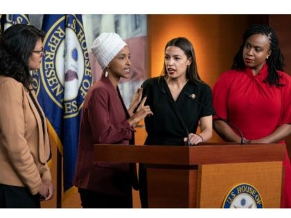 From left, Rep. Rashida Tlaib, D-Mich., Rep. Ilhan Omar, D-Minn., Rep. Alexandria Ocasio-Cortez, D-N.Y., and Rep. Ayanna Pressley, D-Mass., respond to remarks by President Donald Trump after his call for the four Democratic congresswomen to go back to their "broken" countries, during a news conference at the Capitol in Washington, …