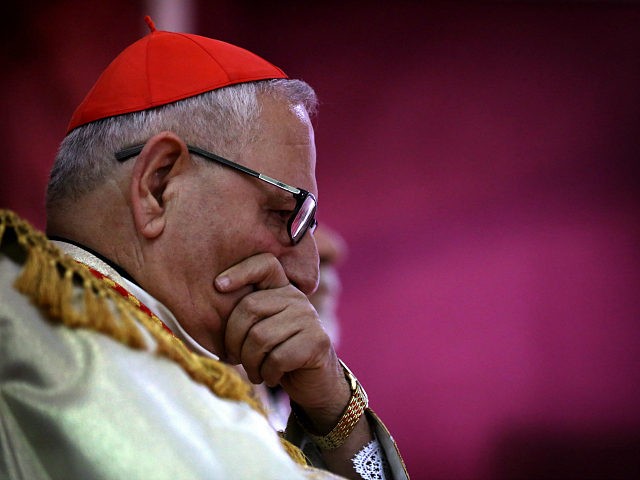 The Patriarch of the Chaldean Church, Louis Raphael Sako takes part in a mass for Easter celebrations led by Cardinal Fernando Filoni (unseen), Pope Francis' special envoy to Iraq and attended by Iraqi Christians who fled the violence in the northern Iraqi city of Mosul, on April 4, 2015 in …
