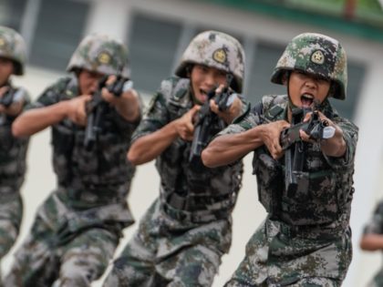 HONG KONG, HONG KONG - June 30: Members of the People's Liberation Army (PLA) perform dril