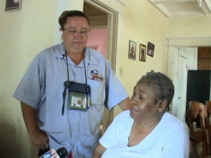 Mail carrier Christy Zahnter rallied a neighborhood to find a window air conditioner for Lovie Weekly. Weekly hadn't had an air conditioner for years. (Source: WDAF/CNN)