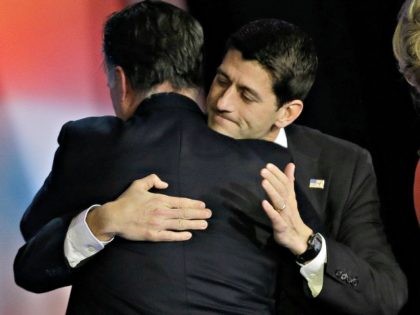 Republican presidential candidate and former Massachusetts Gov. Mitt Romney embraces Republican vice presidential candidate, Rep. Paul Ryan, R-Wis., after Romney conceded the race during his election night rally, Wednesday, Nov. 7, 2012, in Boston. (AP Photo/David Goldman)