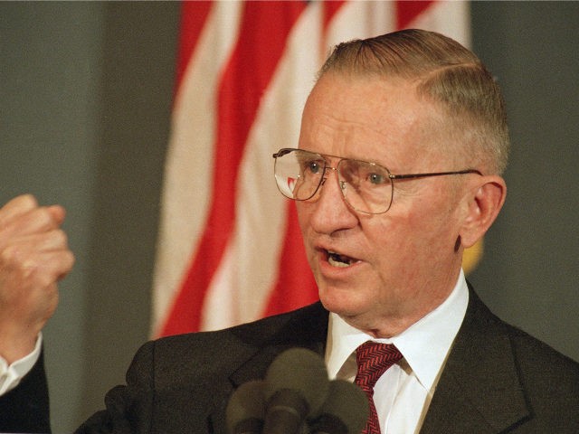 Ross Perot gestures while speaking on Tuesday, April 25, 1995 at the National Press Club i