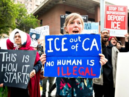 eople protest outside a speech by Attorney General Jeff Sessions March 7, 2018, in Sacrame