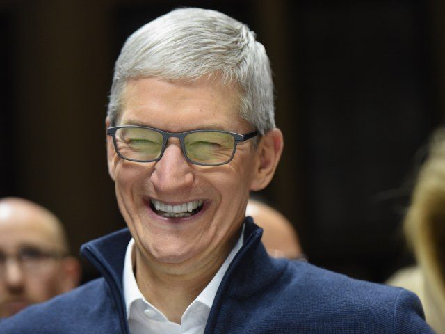 Tim Cook CEO of Apple laughing